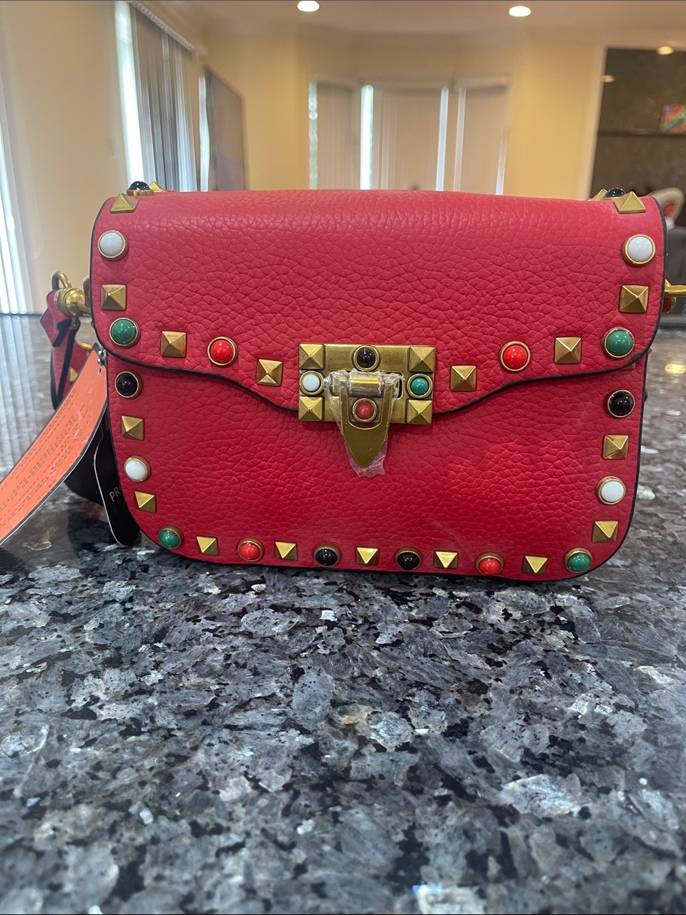 Red Leather Studded Crossbody Bag with Multicolor Accents